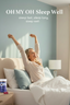 Woman waking up in bed with 'OH MY OH Sleep Well' product on nightstand